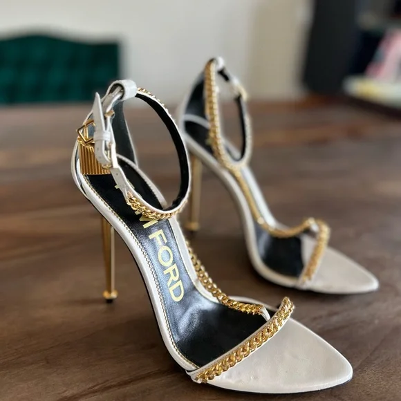 シューズ・サンダルその他 [TOM FORD] Woman Heeled sandals Gold TOM FORD Padlock $1350 Gold Laminated Leather Pointy Naked